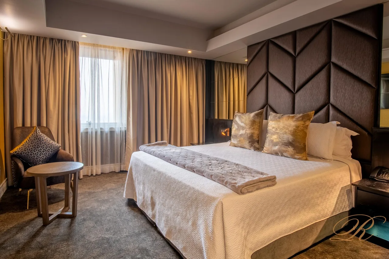 Rainbow Towers Hotel and Conference Centre — rooms and atmosphere