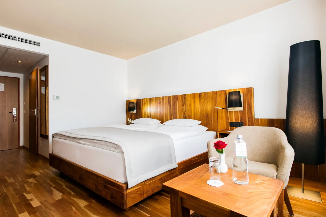 Rogner Hotel Tirana — rooms and atmosphere
