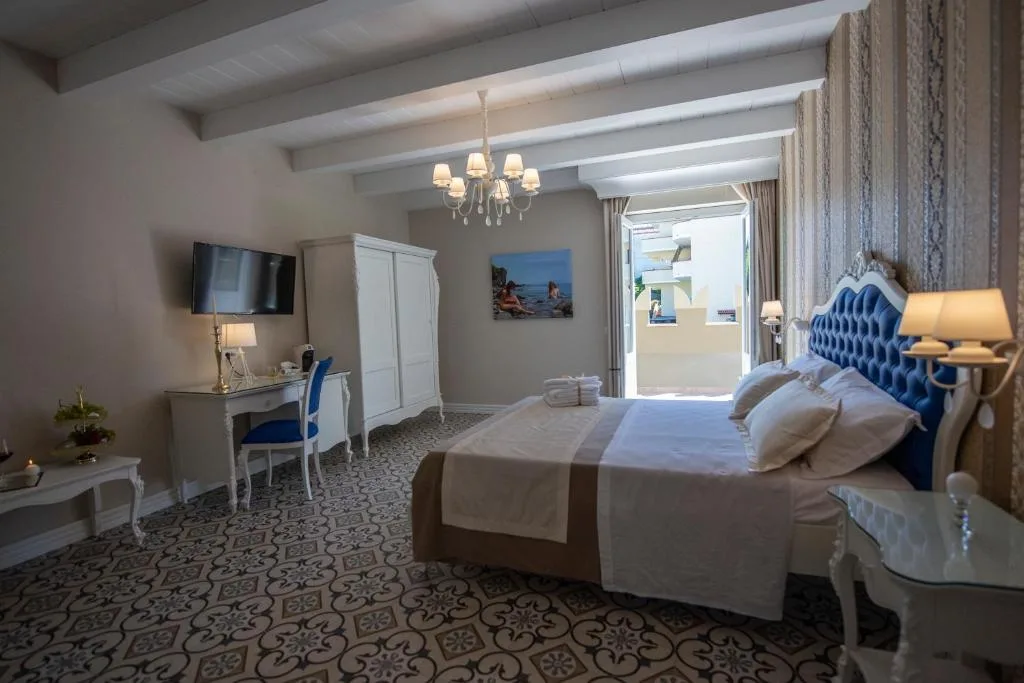 Sui Generis Tropea Luxury Rooms — ภาพห้องพักและบรรยากาศ