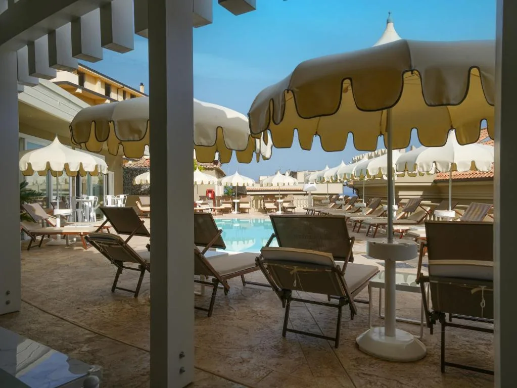 Sui Generis Tropea Luxury Rooms — ภาพห้องพักและบรรยากาศ