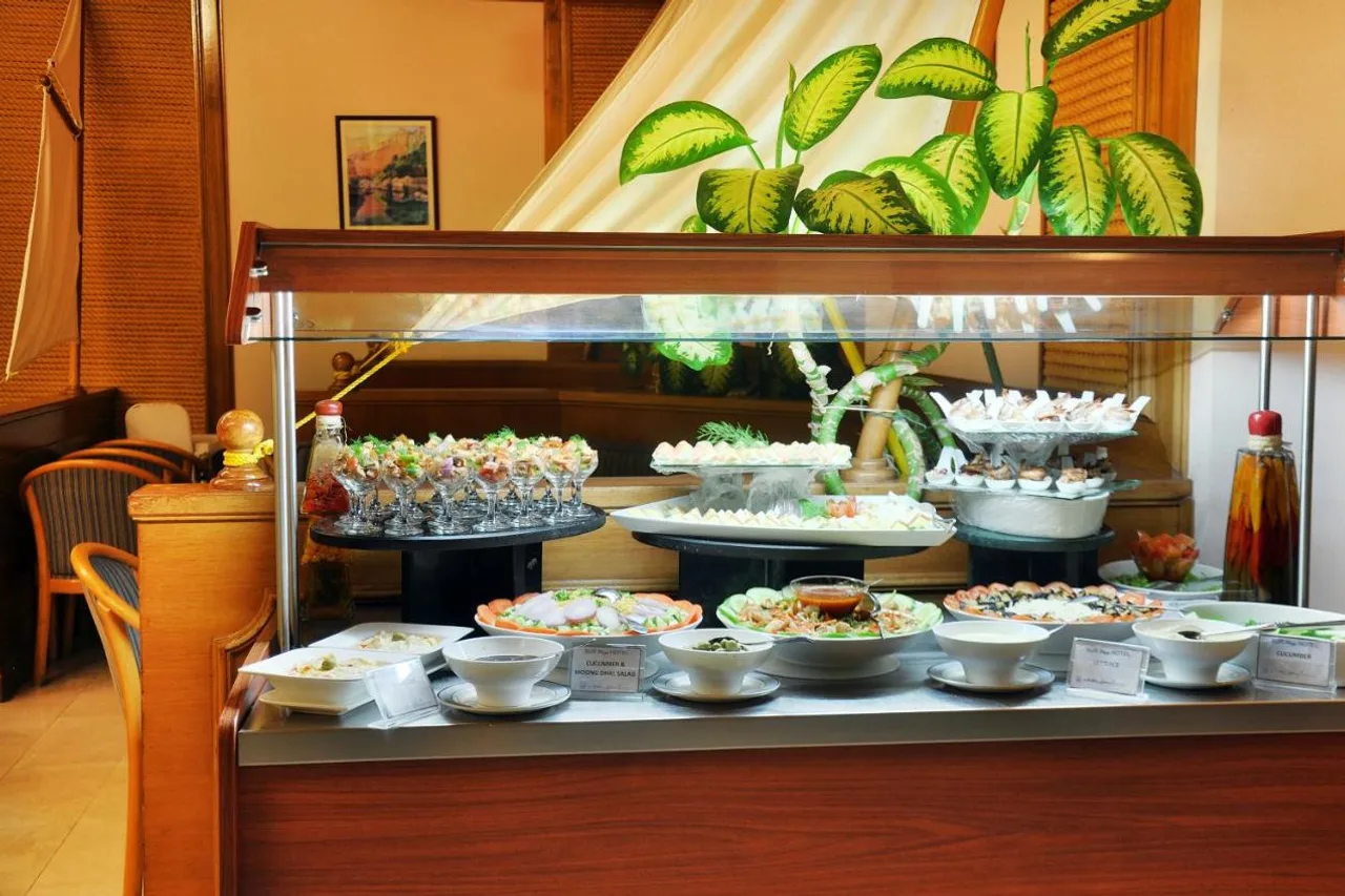 Sur Plaza Hotel — ภาพห้องพักและบรรยากาศ