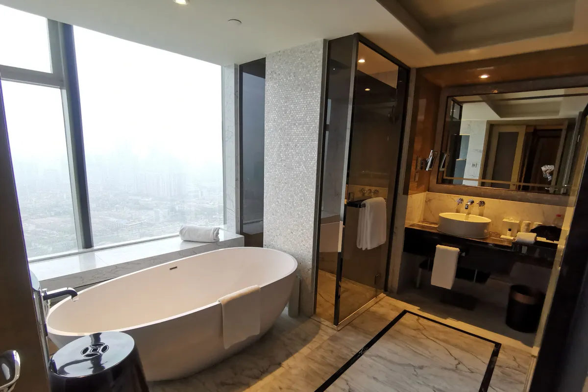 Tangla Hotel Tianjin — rooms and atmosphere