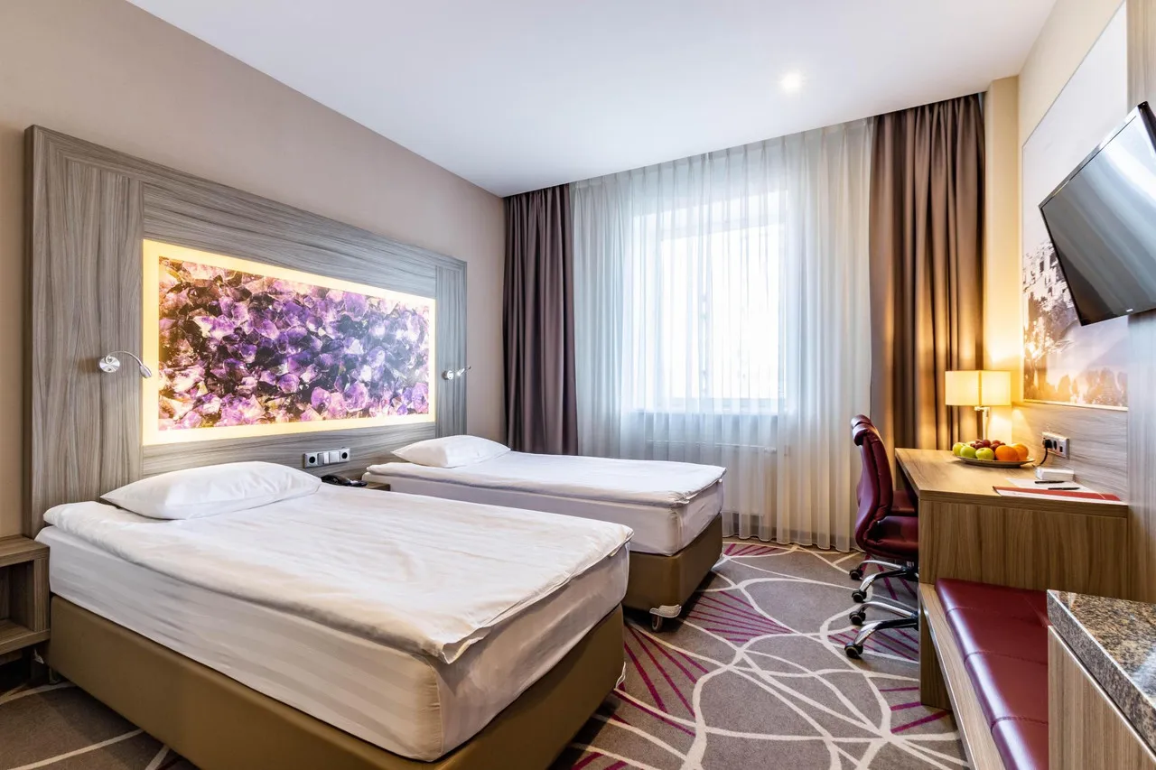 Tenet Hotel — ภาพห้องพักและบรรยากาศ