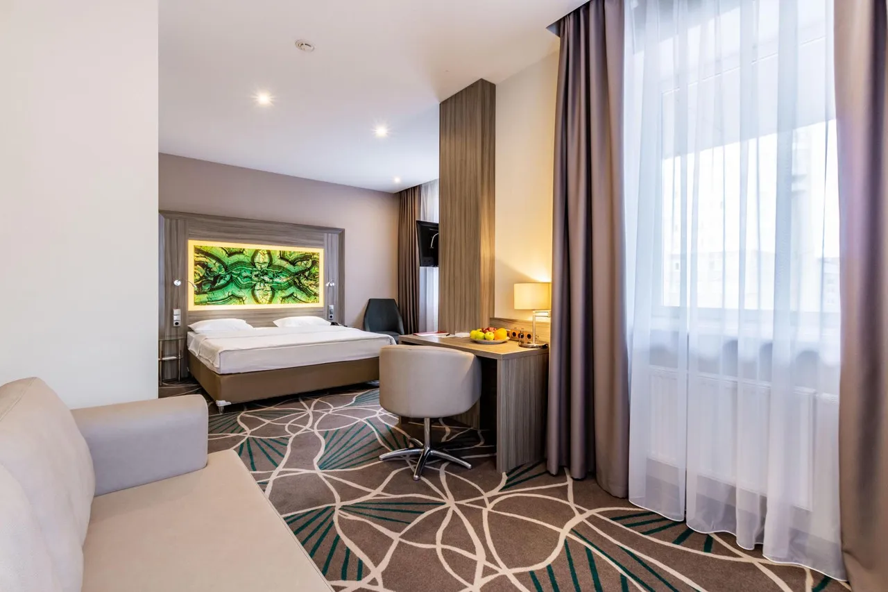 Tenet Hotel — ภาพห้องพักและบรรยากาศ