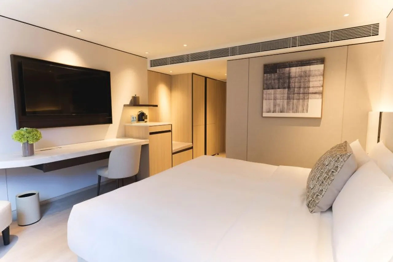 The Bauhinia Hotel - Central — rooms and atmosphere