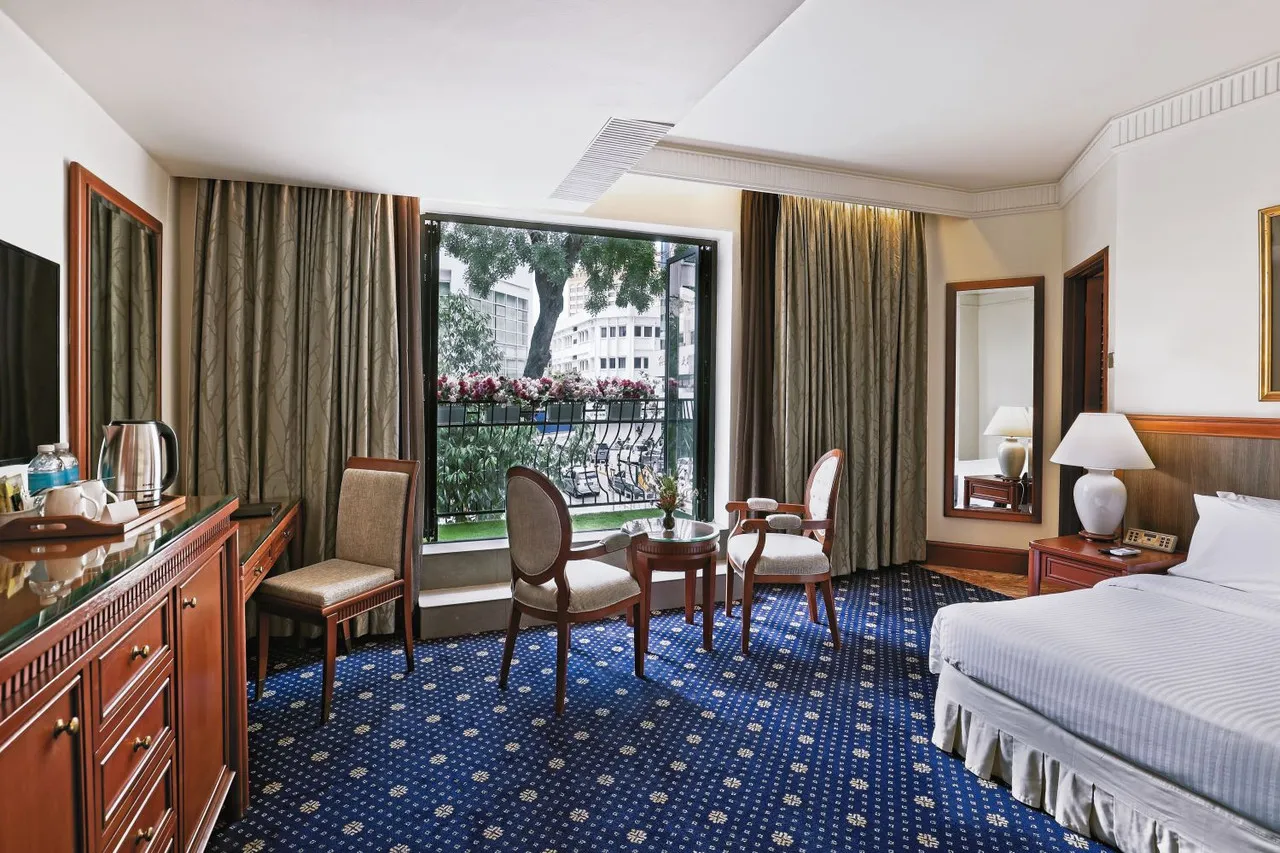 The Jesselton Hotel — rooms and atmosphere