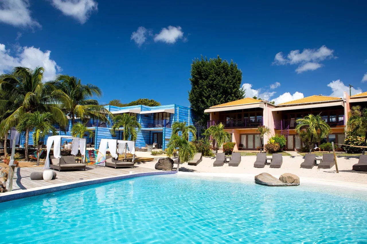 True Blue Bay Boutique Resort — rooms and atmosphere