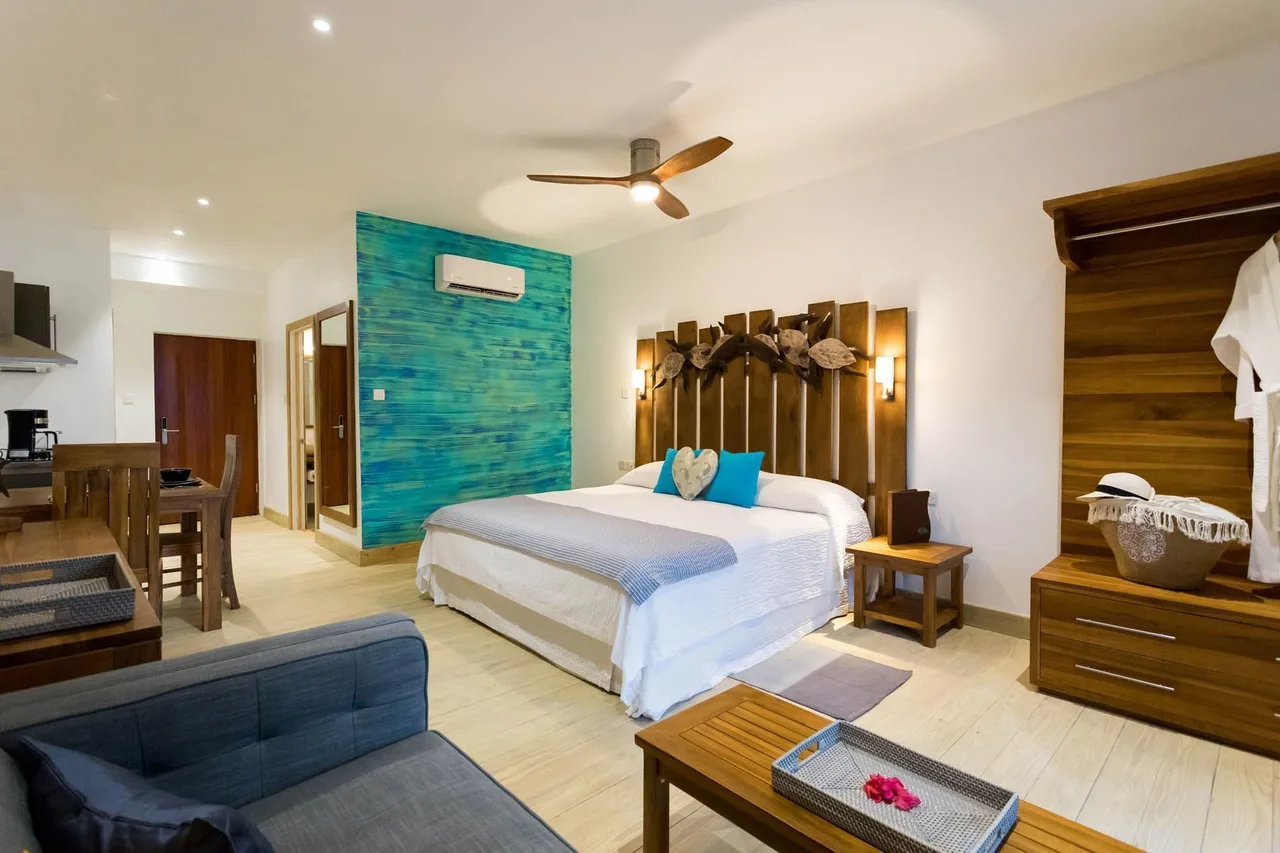 True Blue Bay Boutique Resort — rooms and atmosphere
