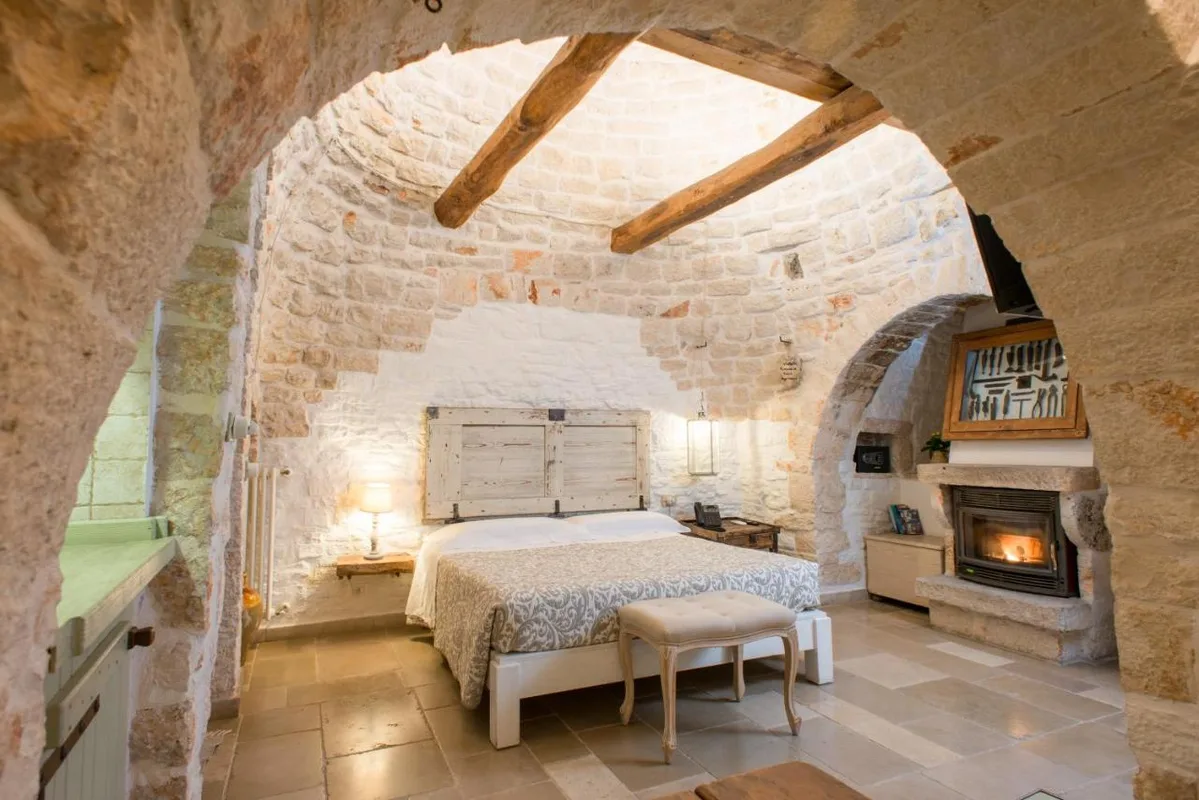 Trulli Holiday Albergo Diffuso — ภาพห้องพักและบรรยากาศ