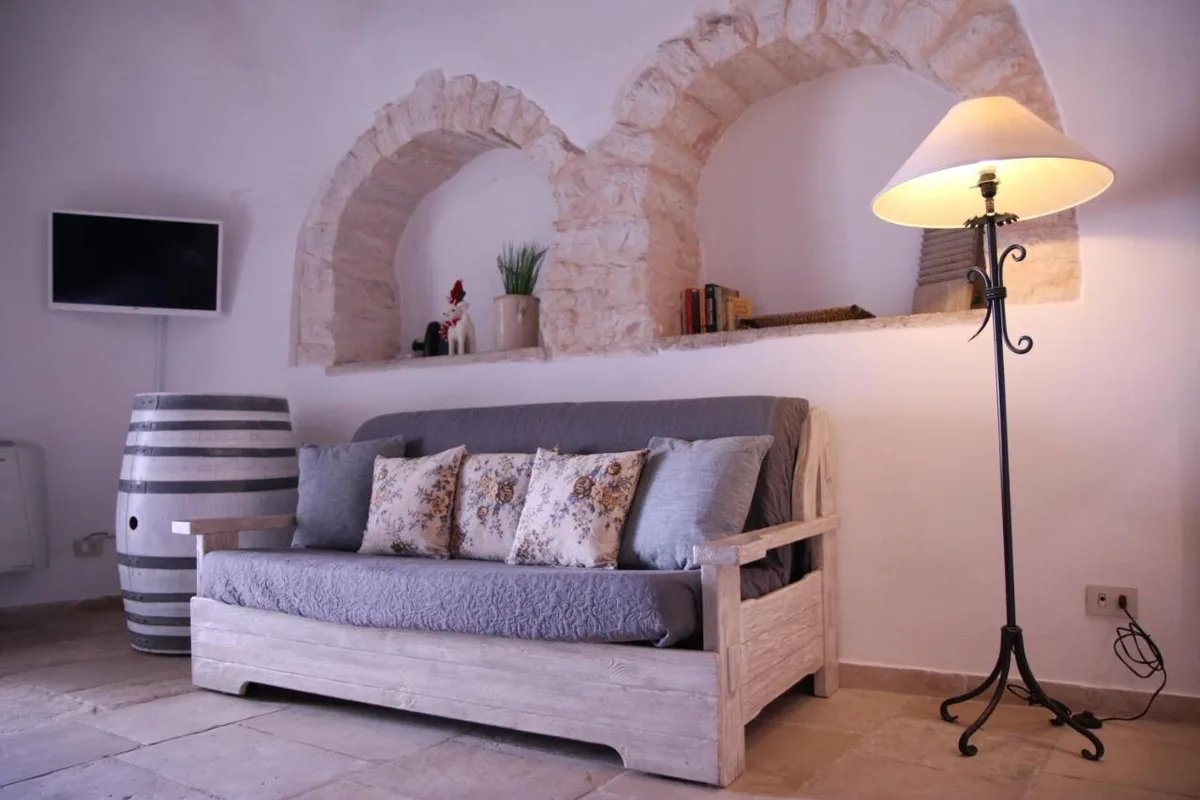 Trulli Holiday Albergo Diffuso — ภาพห้องพักและบรรยากาศ