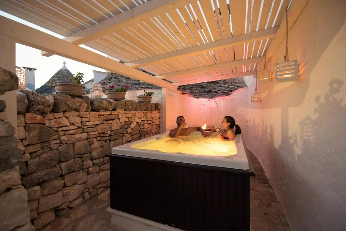 Trulli Holiday Deluxe & Wellness — ภาพห้องพักและบรรยากาศ