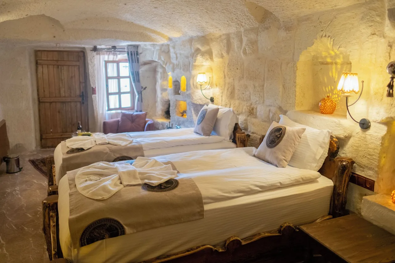 Urgup Evi Cave Hotel — ภาพห้องพักและบรรยากาศ