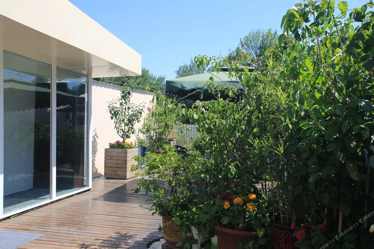 Xingshe Alley Courtyard Hotel Beijing — rooms and atmosphere